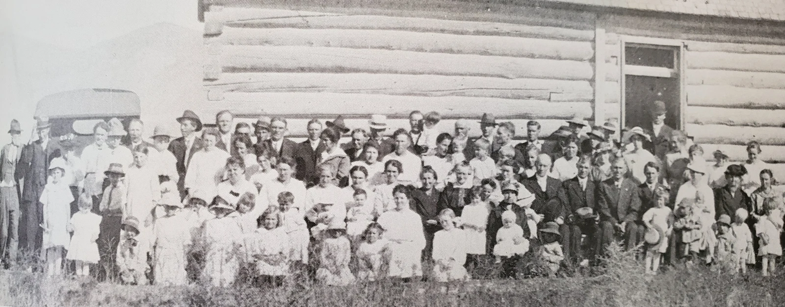 A community gathered at the Meadow Ward building